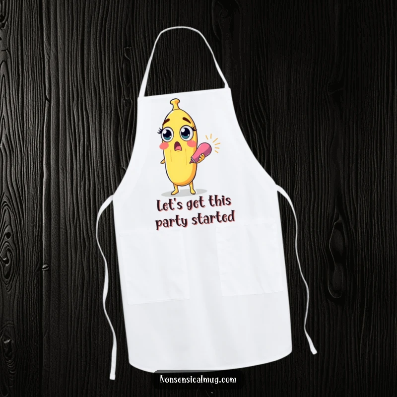 Funny surprised banana character with wide eyes holding a party popper on a practical kitchen apron, offering humorous cooking fun.