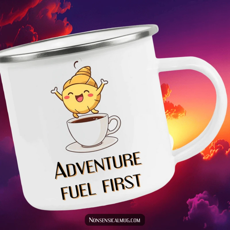 Funny croissant character leaping over a coffee cup on a rugged camping mug, perfect for outdoor coffee lovers.