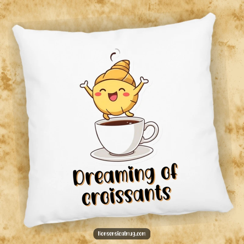 Soft, plush funny croissant pillow showing a happy character leaping over a coffee cup, ideal for adding humor to sofas.