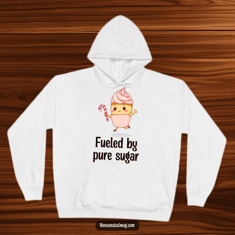 Funny kawaii cupcake character energetically jumping rope with a candy cane, featured on a soft hoodie, ideal for cozy humor.