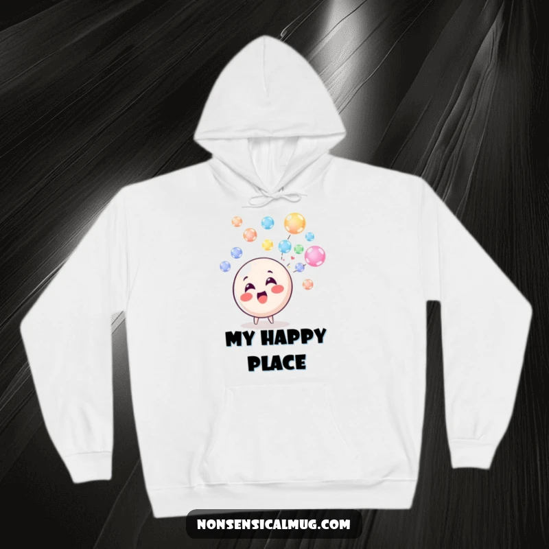 Funny Hoodie: A delighted circle character happily blowing a stream of colorful, floating bubbles, perfect for cozy, cheerful days.