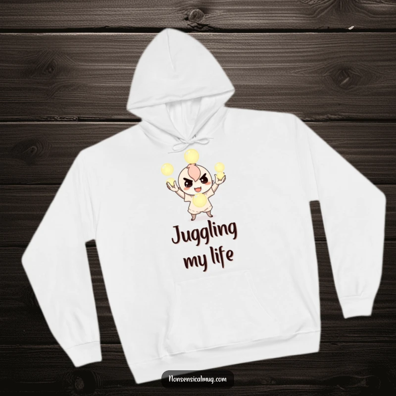 Funny hoodie featuring a mischievous character juggling glowing orbs, radiating an aura of playful magic and fun, perfect for staying warm and stylish.