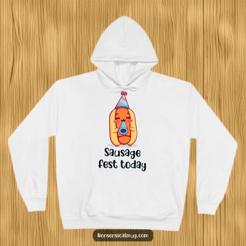 Funny hot dog wearing a party hat and blowing a noisemaker, featured on a warm hoodie for cozy and festive wear.