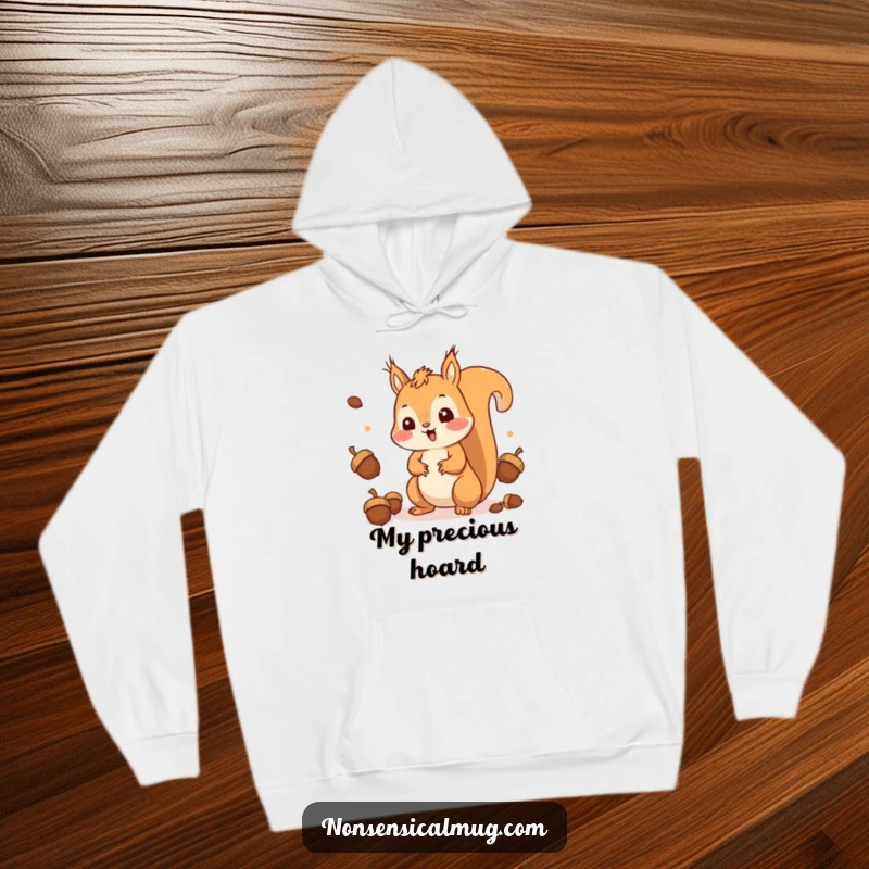 Funny Squirrel Hoodie: A happy, surprised squirrel juggling acorns, radiating cute and comical energy.