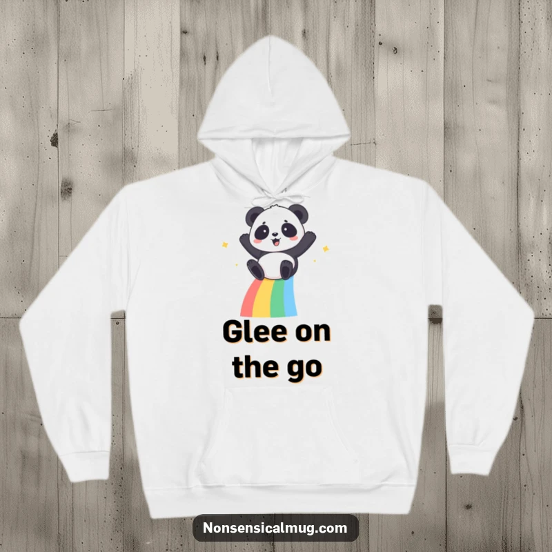 Kawaii Panda Hoodie: A gleeful kawaii panda sliding down a bright rainbow, radiating happiness and warmth.