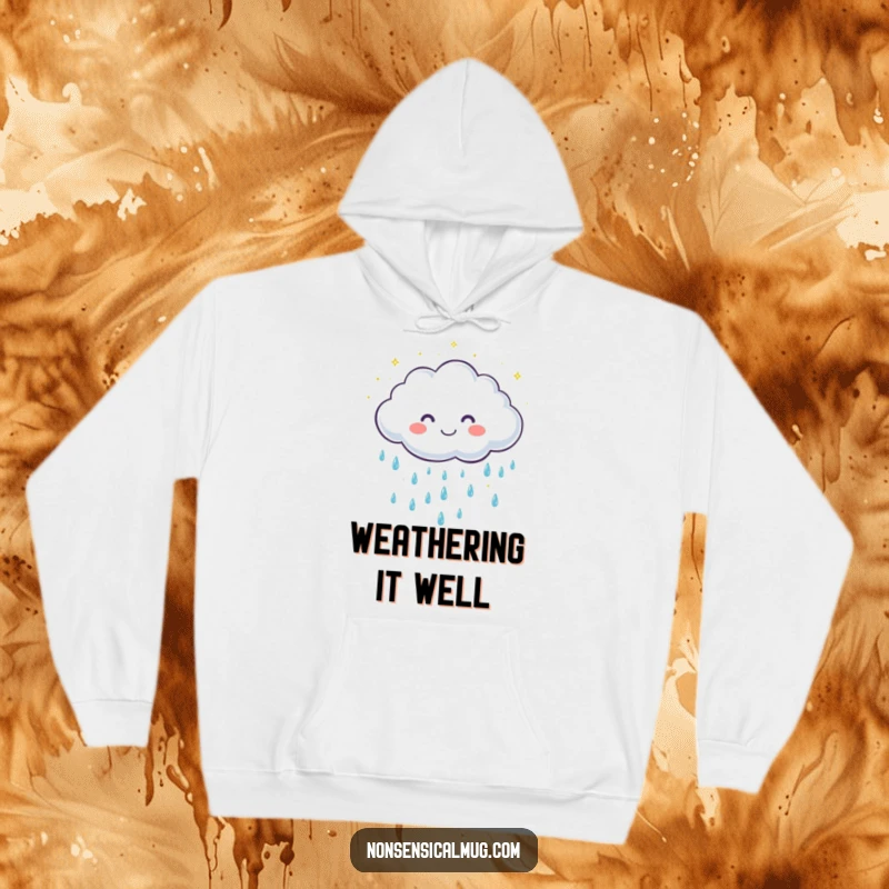 Funny hoodie featuring a cute, smiling cloud character showering down gentle, sparkling raindrops, offering cozy and cheerful vibes.