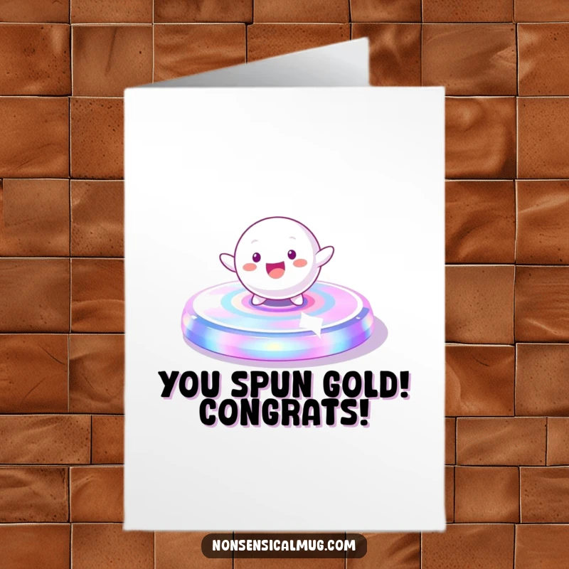 Funny Free Printable Congratulations Card: Playful spherical character spinning on an iridescent platform, perfect for celebrating success.