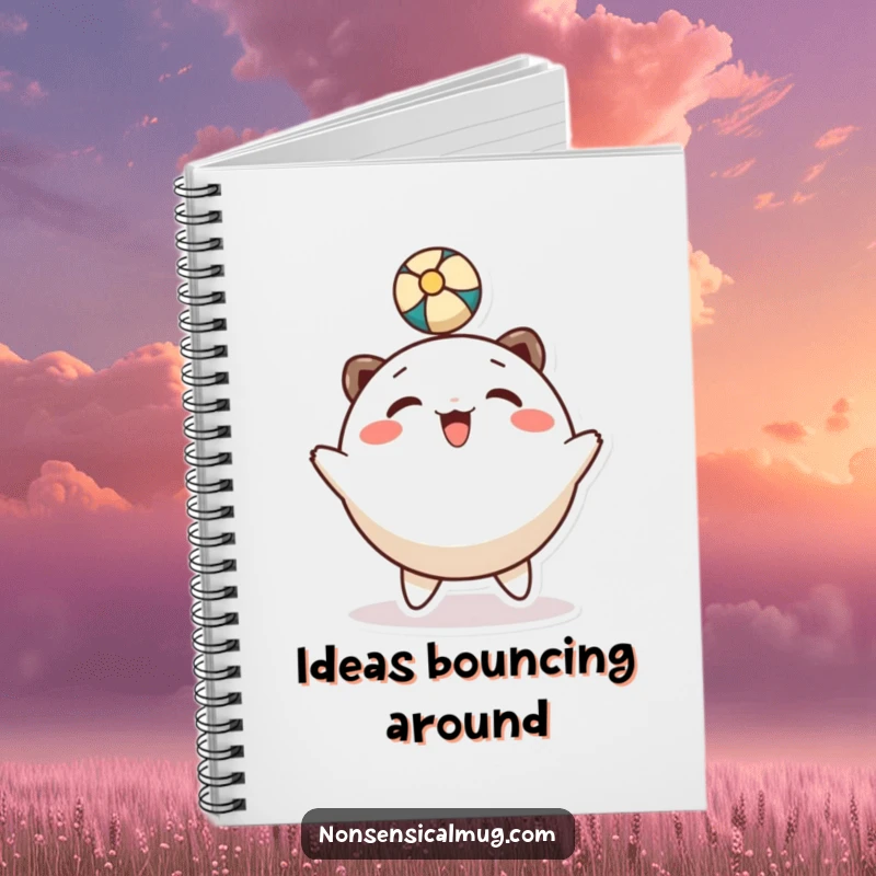 Funny notebook: a round, smiling character gleefully bounces a ball with its head, ideal for writing.