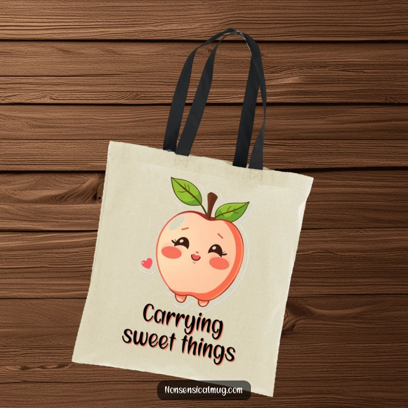 Funny tote bag featuring a blushing apple character joyfully blowing a kiss, perfect for carrying items with a sweet sentiment.
