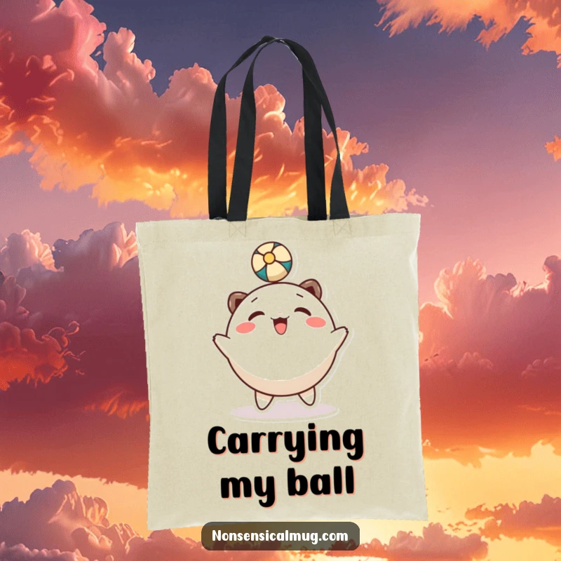 Funny tote bag: a smiling, round character energetically bounces a ball using its head.