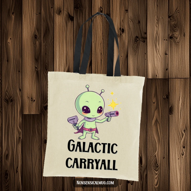 Funny Kawaii Alien Sparkle Ray Gun Tote Bag: A cute alien wields a ray gun shooting glittery sparkles, a stylish carry-all.
